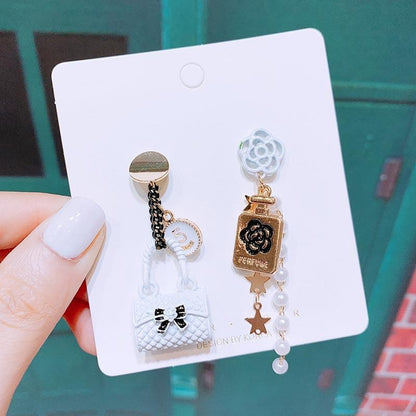 Asymmetrical small fragrance flower tassel earrings